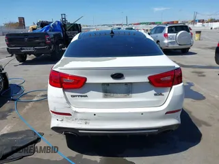 2015 Kia Optima SX Turbo with VIN 5XXGR4A63FG470724, listed as a IAAI auction lot 42006500 with 188,422 mi miles. Bid and sale history available at carsss.com. Image 16.