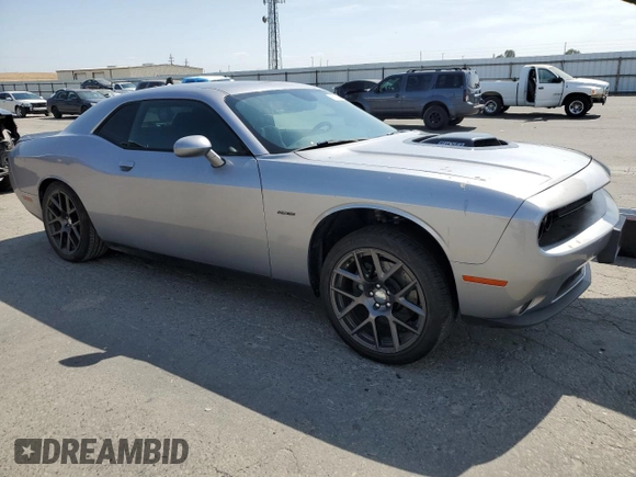 2016 Dodge Challenger R/T Plus with VIN 2C3CDZBT8GH101892, listed as a Copart auction lot 62171595 with 195,533 mi miles and Salvage title. Bid and sale history available at DreamBid. Image 4.