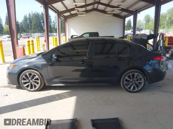2022 Toyota Corolla SE with VIN JTDS4MCE3NJ094596, listed as a IAAI auction lot 42117369 with 92,045 mi miles and . Bid and sale history available at DreamBid. Image 14.