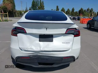 2022 Tesla Model Y Performance z VIN 7SAYGDEF2NF347456, wystawiony jako IAAI lot #42177725 z przebiegiem 29 374 mil mil oraz . Historia ofert i sprzedaży dostępna na DreamBid. Obrazek 17.