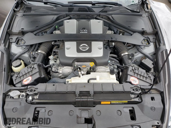 2009 Nissan 370Z Touring with VIN JN1AZ44E69M404789, listed as a Copart auction lot 62015094 with 56,447 mi miles and Salvage Title. Bid and sale history available at carsss.com. Image 11.