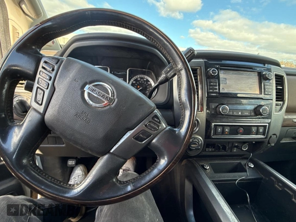 2016 Nissan Titan XD PRO-4X with VIN 1N6BA1F40GN515810, listed as a Copart auction lot 87436204 with 210,650 mi miles and Clean Title. Bid and sale history available at carsss.com. Image 9.