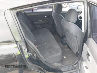 2009 Nissan Versa 1.8 SL with VIN 3N1BC13E59L496882, listed as a IAAI auction lot 41798734 with 210,907 mi miles. Bid and sale history available at carsss.com. Image 8.