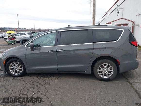 2021 Chrysler Pacifica Touring L with VIN 2C4RC1BG0MR543634, listed as a IAAI auction lot 41513467 with 148,010 mi miles and . Bid and sale history available at DreamBid. Image 14.