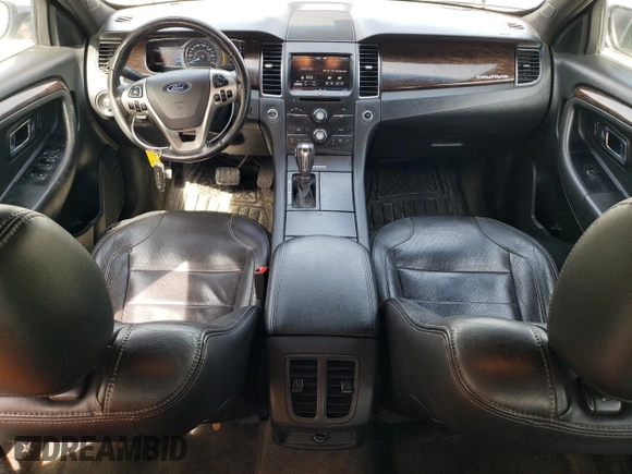2014 Ford Taurus Limited with VIN 1FAHP2F83EG106227, listed as a Copart auction lot 63055365 with 194,026 mi miles and Salvage title. Bid and sale history available at DreamBid. Image 8.