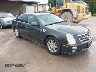 2008 Cadillac STS RWD with VIN 1G6DK67V980165768, listed as a IAAI auction lot 42185454 with 214,813 mi miles and . Bid and sale history available at DreamBid. Image 1.