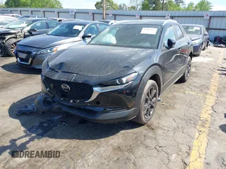 2025 Mazda CX-30 S Select Sport z VIN 3MVDMBBM3SM784464, wystawiony jako IAAI lot #42085045 z przebiegiem 1 953 mil mil oraz . Historia ofert i sprzedaży dostępna na DreamBid. Obrazek 17.