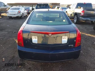 2006 Cadillac CTS with VIN 1G6DM57T060106608, listed as a IAAI auction lot 41233161 with 141,503 mi miles. Bid and sale history available at carsss.com. Image 16.