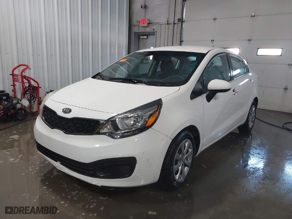 2012 Kia Rio LX with VIN KNADM4A30C6057030, listed as a IAAI auction lot 41570745 with 153,231 mi miles. Bid and sale history available at carsss.com. Image 2.