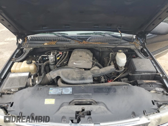 2005 Chevrolet Suburban LT with VIN 1GNFK16Z05J183523, listed as a Copart auction lot 58595325 with 248,732 mi miles and Salvage title. Bid and sale history available at DreamBid. Image 12.
