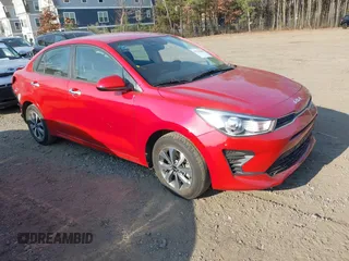 2023 Kia Rio S z VIN 3KPA24AD1PE554690, wystawiony jako IAAI lot #41710386 z przebiegiem 30 760 mil mil oraz . Historia ofert i sprzedaży dostępna na DreamBid. Obrazek 1.