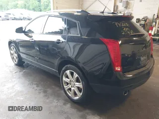 2014 Cadillac SRX Performance Collection with VIN 3GYFNFE39ES659013, listed as a IAAI auction lot 42264069 with 129,122 mi miles and . Bid and sale history available at DreamBid. Image 3.