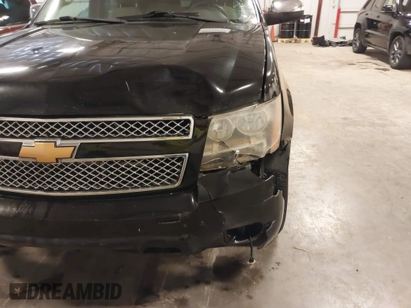 2012 Chevrolet Tahoe LTZ with VIN 1GNSKCE02CR297261, listed as a IAAI auction lot 40255137 with 283,110 mi miles and . Bid and sale history available at DreamBid. Image 6.