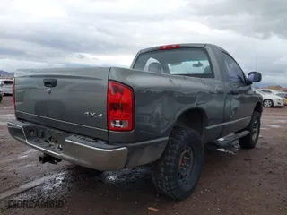 2005 Dodge Ram 1500 SLT with VIN 1D7HU16N35J650321, listed as a IAAI auction lot 41754294 with 166,531 mi miles. Bid and sale history available at carsss.com. Image 4.