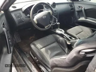2007 Hyundai Tiburon GS z VIN KMHHM66D47U243846, wystawiony jako Copart lot #57509725 z przebiegiem 181 941 mil mil oraz Szkoda całkowita • Salvage title. Historia ofert i sprzedaży dostępna na DreamBid. Obrazek 8.
