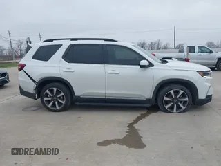 2023 Honda Pilot Elite with VIN 5FNYG1H88PB000855, listed as a IAAI auction lot 41574247 with 47,011 mi miles. Bid and sale history available at carsss.com. Image 13.
