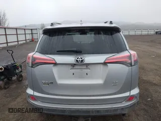2018 Toyota RAV4 LE with VIN 2T3BFREV9JW724606, listed as a IAAI auction lot 41862028 with 98,590 mi miles. Bid and sale history available at carsss.com. Image 16.