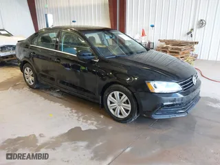2017 Volkswagen Jetta 1.4T S with VIN 3VW167AJ5HM329706, listed as a IAAI auction lot 40801058 with 144,103 mi miles. Bid and sale history available at carsss.com. Image 1.