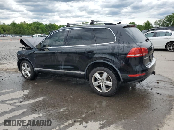 2012 Volkswagen Touareg Sport z VIN WVGEF9BP7CD009824, wystawiony jako Copart lot #58311915 z przebiegiem 154 397 mil mil oraz Szkoda całkowita • Salvage title. Historia ofert i sprzedaży dostępna na DreamBid. Obrazek 2.