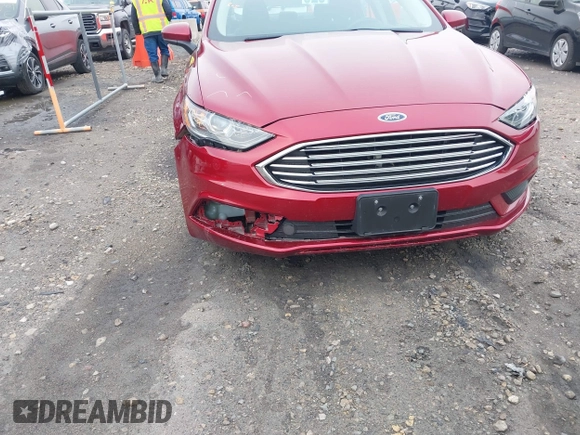 2017 Ford Fusion SE with VIN 3FA6P0H75HR221571, listed as a IAAI auction lot 42452297 with 91,354 mi miles and . Bid and sale history available at DreamBid. Image 6.