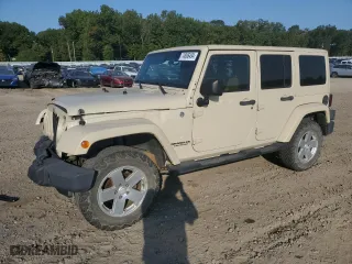 2011 Jeep Wrangler Unlimited Sahara with VIN 1J4BA5H10BL558961, listed as a Copart auction lot 74806494 with 172,855 mi miles and Salvage Title. Bid and sale history available at carsss.com. Image 1.