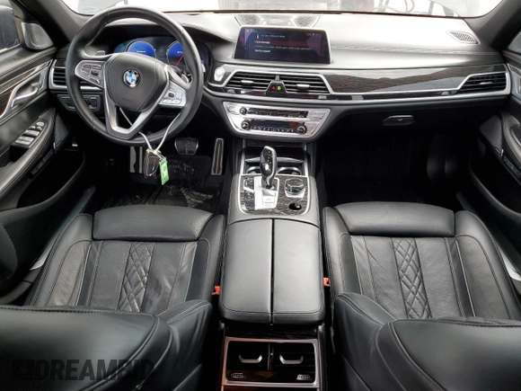 2018 BMW 7 Series 750i with VIN WBA7F0C58JGM23743, listed as a Copart auction lot 63465144 with 44,580 mi miles and Salvage Title. Bid and sale history available at carsss.com. Image 8.