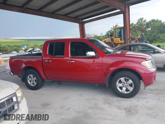2012 Nissan Frontier SV with VIN 1N6AD0ER5CC458181, listed as a IAAI auction lot 42742536 with 308,786 mi miles and . Bid and sale history available at DreamBid. Image 13.