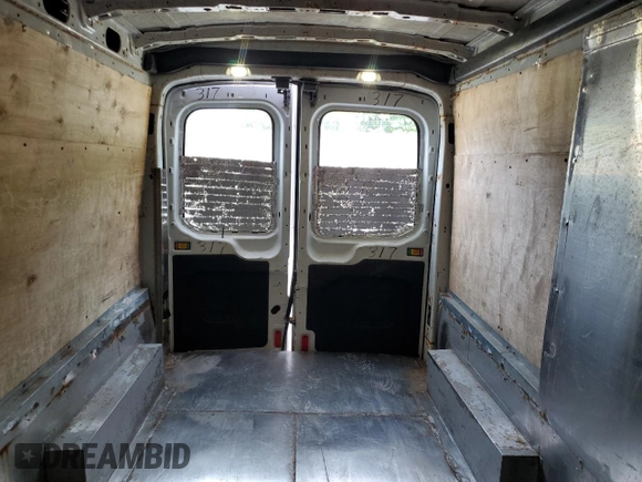 2017 Ford Transit z VIN 1FTYR2CM7HKA08891, wystawiony jako Copart lot #61787755 z przebiegiem 149 439 mil mil oraz Szkoda całkowita • Salvage title. Historia ofert i sprzedaży dostępna na DreamBid. Obrazek 10.
