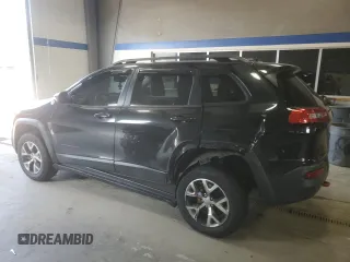 2014 Jeep Cherokee Trailhawk with VIN 1C4PJMBB8EW171116, listed as a Copart auction lot 60107215 with 168,979 mi miles and Salvage title. Bid and sale history available at DreamBid. Image 2.