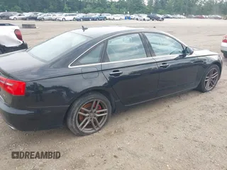 2015 Audi A6 Premium Plus z VIN WAUGFAFCXFN010306, wystawiony jako IAAI lot #42505993 z przebiegiem Nie podano mil oraz . Historia ofert i sprzedaży dostępna na DreamBid. Obrazek 4.