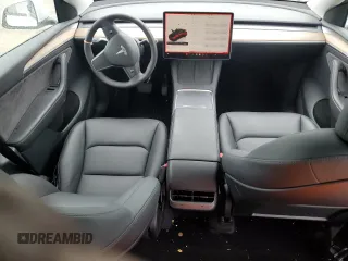 2022 Tesla Model Y Long Range z VIN 7SAYGDEE5NA016276, wystawiony jako Copart lot #55942355 z przebiegiem 14 085 mil mil oraz Szkody całkowita. Historia ofert i sprzedaży dostępna na DreamBid. Obrazek 8.