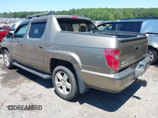 2011 Honda Ridgeline RTL with VIN 5FPYK1F57BB452321, listed as a IAAI auction lot 42306915 with Not provided miles and . Bid and sale history available at DreamBid. Image 3.
