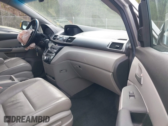 2012 Honda Odyssey Touring with VIN 5FNRL5H98CB026754, listed as a IAAI auction lot 41935562 with 165,626 mi miles. Bid and sale history available at carsss.com. Image 5.