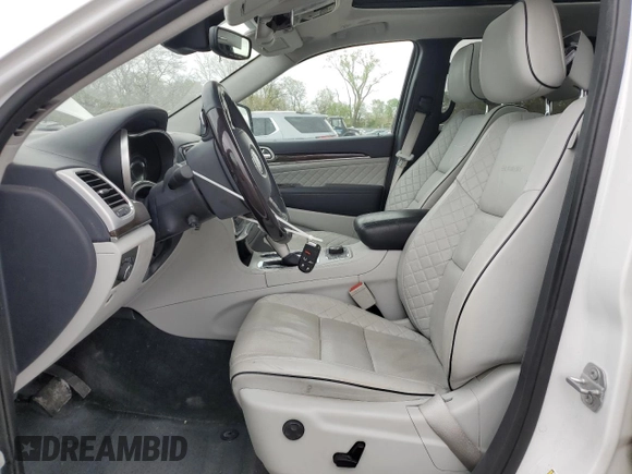 2019 Jeep Grand Cherokee Summit with VIN 1C4RJFJT4KC848996, listed as a Copart auction lot 54974925 with 106,517 mi miles and Salvage title. Bid and sale history available at DreamBid. Image 7.