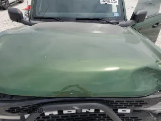 2024 Ford Bronco Wildtrak z VIN 1FMEE2BPXRLB03494, wystawiony jako Copart lot #53852225 z przebiegiem 5 166 mil mil oraz Szkoda całkowita • Salvage title. Historia ofert i sprzedaży dostępna na DreamBid. Obrazek 12.