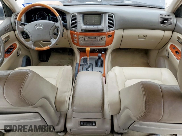 2003 Lexus LX 470 z VIN JTJHT00W033530306, wystawiony jako Copart lot #57162675 z przebiegiem 185 458 mil mil oraz Szkoda całkowita • Salvage title. Historia ofert i sprzedaży dostępna na DreamBid. Obrazek 8.