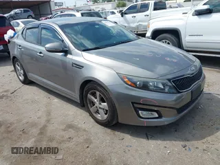 2015 Kia Optima LX with VIN 5XXGM4A71FG423232, listed as a IAAI auction lot 42054131 with 135,213 mi miles. Bid and sale history available at carsss.com. Image 1.