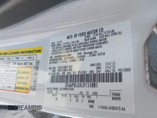 2020 Ford Fusion SE with VIN 3FA6P0LUXLR155881, listed as a IAAI auction lot 42426199 with 103,809 mi miles and . Bid and sale history available at DreamBid. Image 9.
