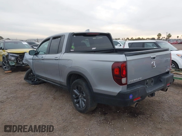 2023 Honda Ridgeline Sport z VIN 5FPYK3F16PB049866, wystawiony jako IAAI lot #41068916 z przebiegiem Nie podano mil oraz . Historia ofert i sprzedaży dostępna na DreamBid. Obrazek 3.