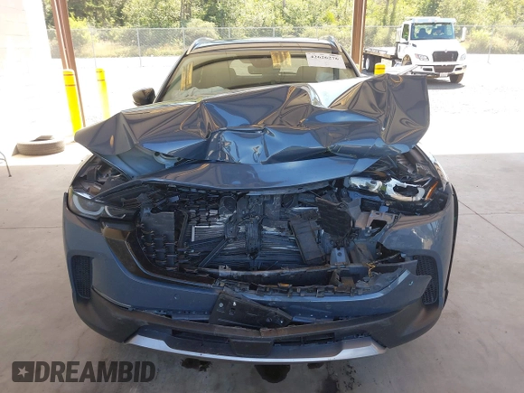 2023 Mazda CX-50 Premium Plus with VIN 7MMVABEY8PN100311, listed as a IAAI auction lot 42626276 with 40,242 mi miles and . Bid and sale history available at DreamBid. Image 12.