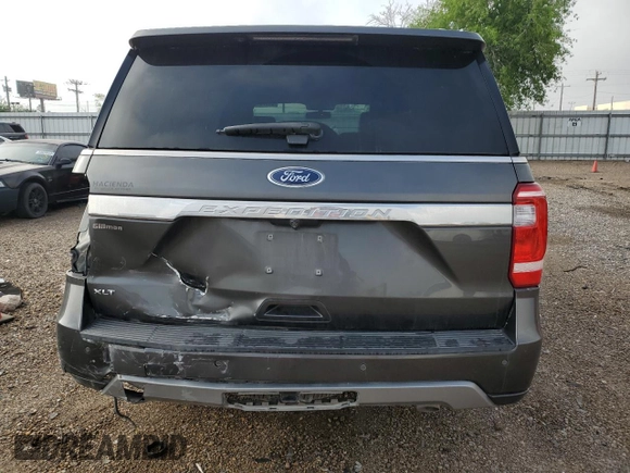 2018 Ford Expedition XLT with VIN 1FMJU1HT4JEA13346, listed as a Copart auction lot 51070495 with 100,130 mi miles and Salvage title. Bid and sale history available at DreamBid. Image 6.
