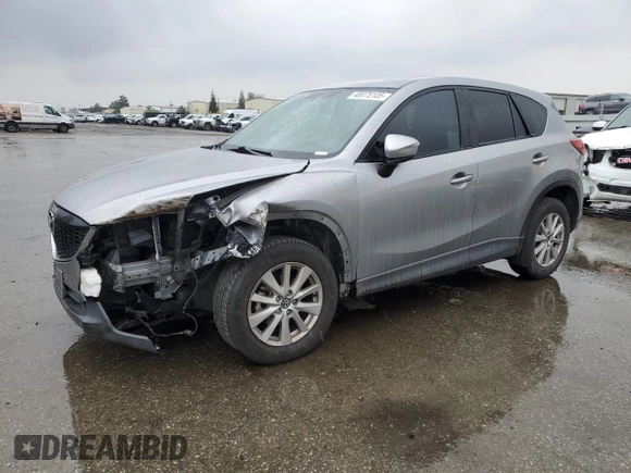2015 Mazda CX-5 Touring with VIN JM3KE2CY4F0469096, listed as a Copart auction lot 48075105 with 131,788 mi miles and Salvage Title. Bid and sale history available at carsss.com. Image 1.