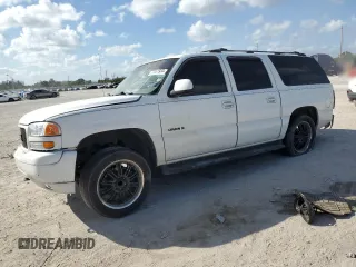2001 GMC Yukon XL SLT with VIN 1GKEC16T51J253741, listed as a Copart auction lot 77461934 with 0 mi miles and Salvage Title. Bid and sale history available at carsss.com. Image 1.