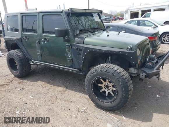 2007 Jeep Wrangler Unlimited X with VIN 1J4GA39147L101084, listed as a IAAI auction lot 41988628 with 194,562 mi miles and . Bid and sale history available at DreamBid. Image 1.