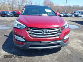 2014 Hyundai Santa Fe z VIN 5XYZUDLB3EG226857, wystawiony jako IAAI lot #41917762 z przebiegiem 42 677 mil mil oraz . Historia ofert i sprzedaży dostępna na DreamBid. Obrazek 17.