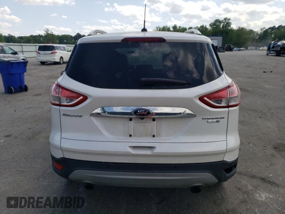 2016 Ford Escape Titanium with VIN 1FMCU9J91GUB52418, listed as a Copart auction lot 52644135 with 107,212 mi miles and Salvage Title. Bid and sale history available at carsss.com. Image 6.