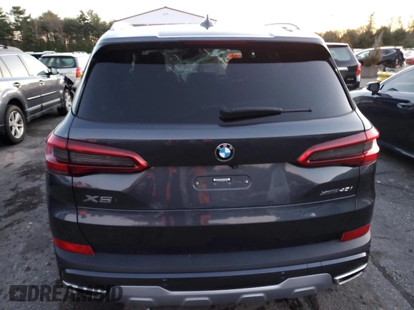 2021 BMW X5 sDrive40i with VIN 5UXCR4C03M9E13698, listed as a Copart auction lot 84158714 with 0 mi miles and Salvage Title. Bid and sale history available at carsss.com. Image 6.