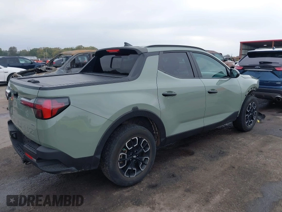 2022 Hyundai Santa Cruz SEL z VIN 5NTJCDAE1NH032206, wystawiony jako IAAI lot #40698704 z przebiegiem 40 182 mil mil oraz . Historia ofert i sprzedaży dostępna na DreamBid. Obrazek 4.