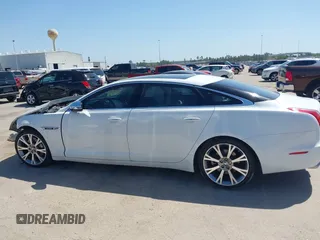 2012 Jaguar XJ XJL with VIN SAJWA2GB3CLV38500, listed as a IAAI auction lot 41990409 with 73,793 mi miles and . Bid and sale history available at DreamBid. Image 14.