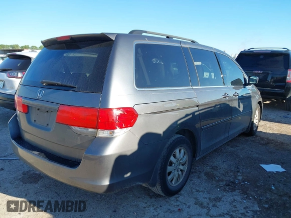 2010 Honda Odyssey EX-L with VIN 5FNRL3H76AB040457, listed as a IAAI auction lot 42214329 with 182,051 mi miles and . Bid and sale history available at carsss.com. Image 4.